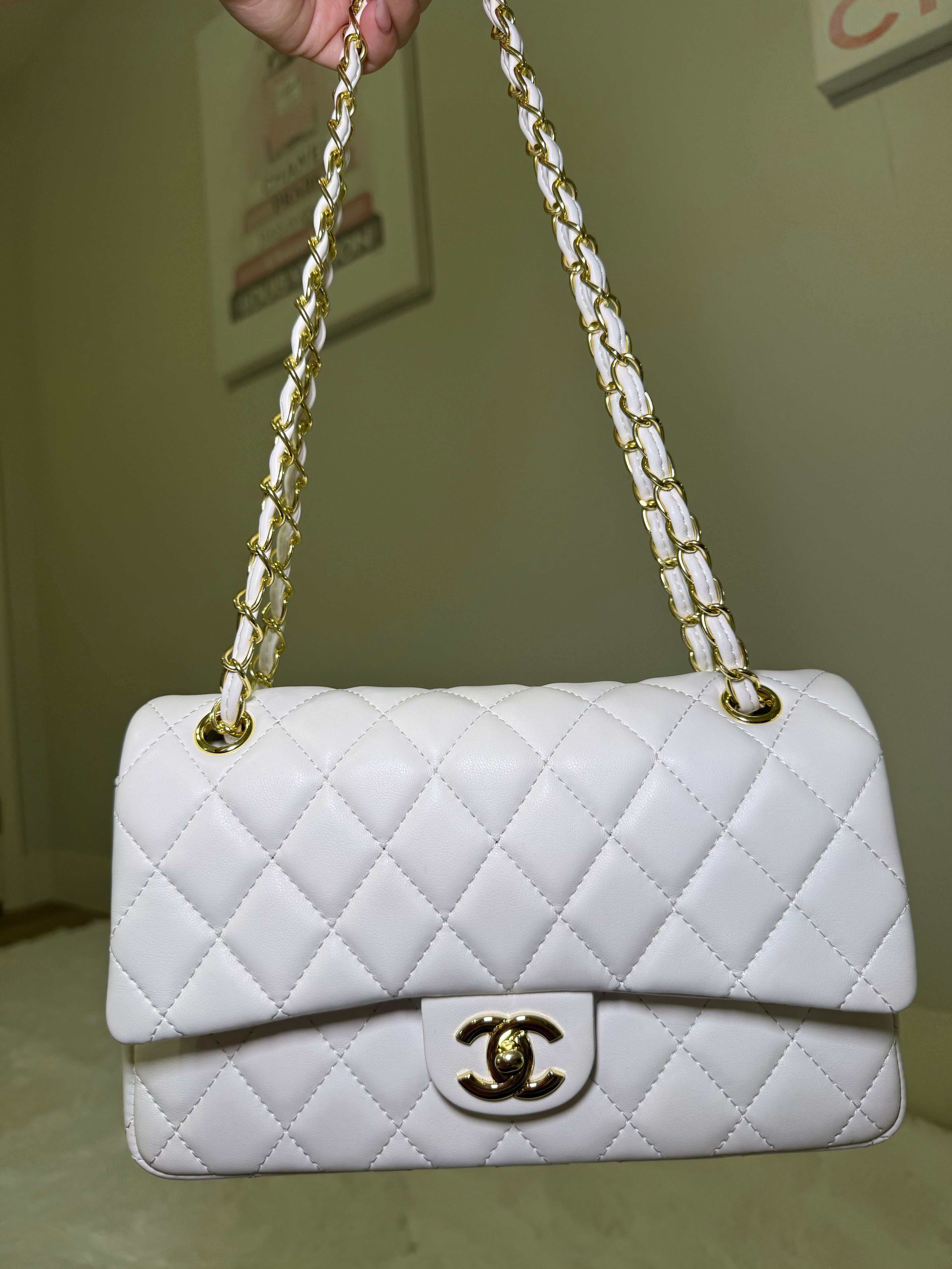 White cc with gold chain