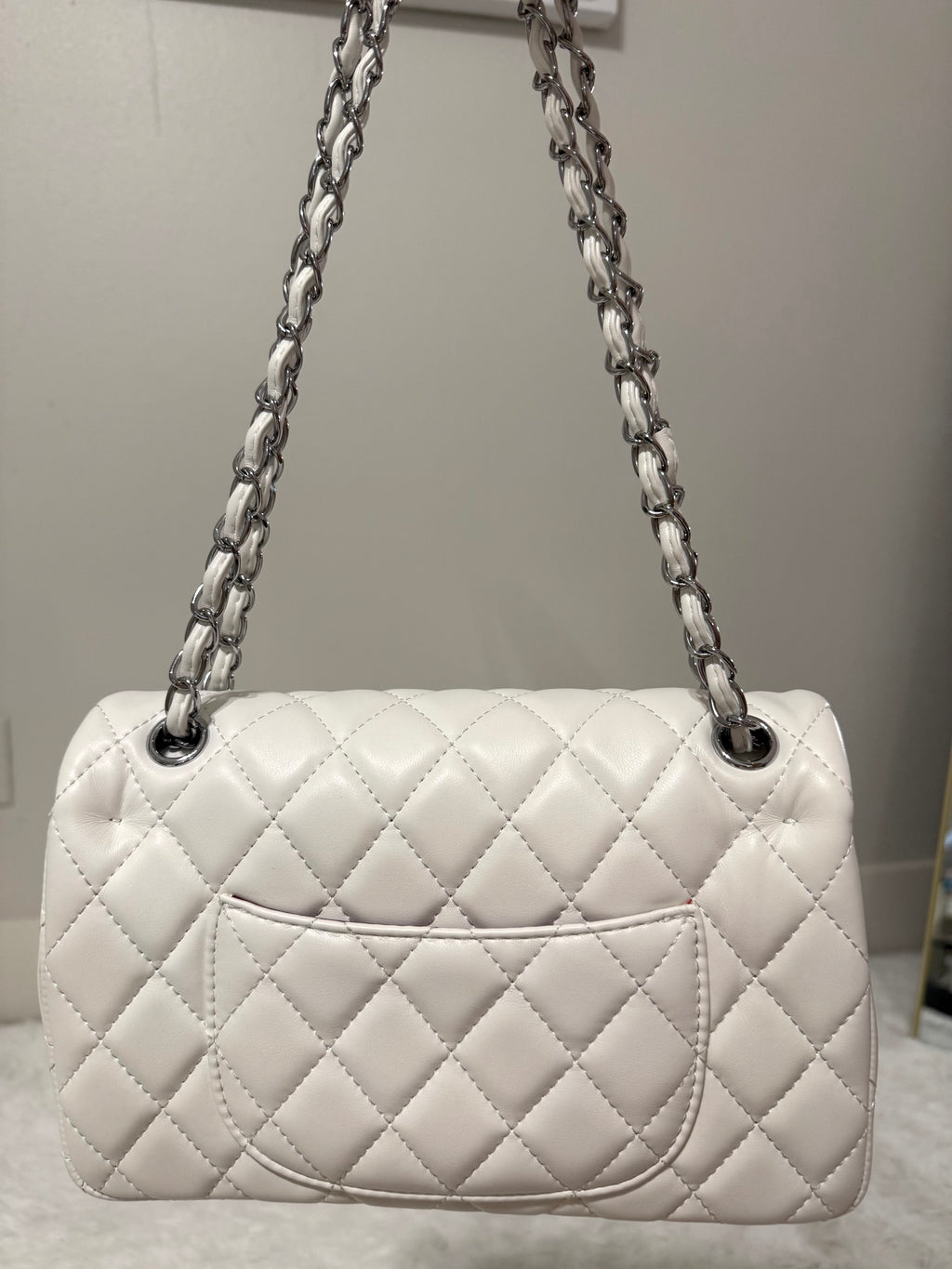 White cc with silver chain