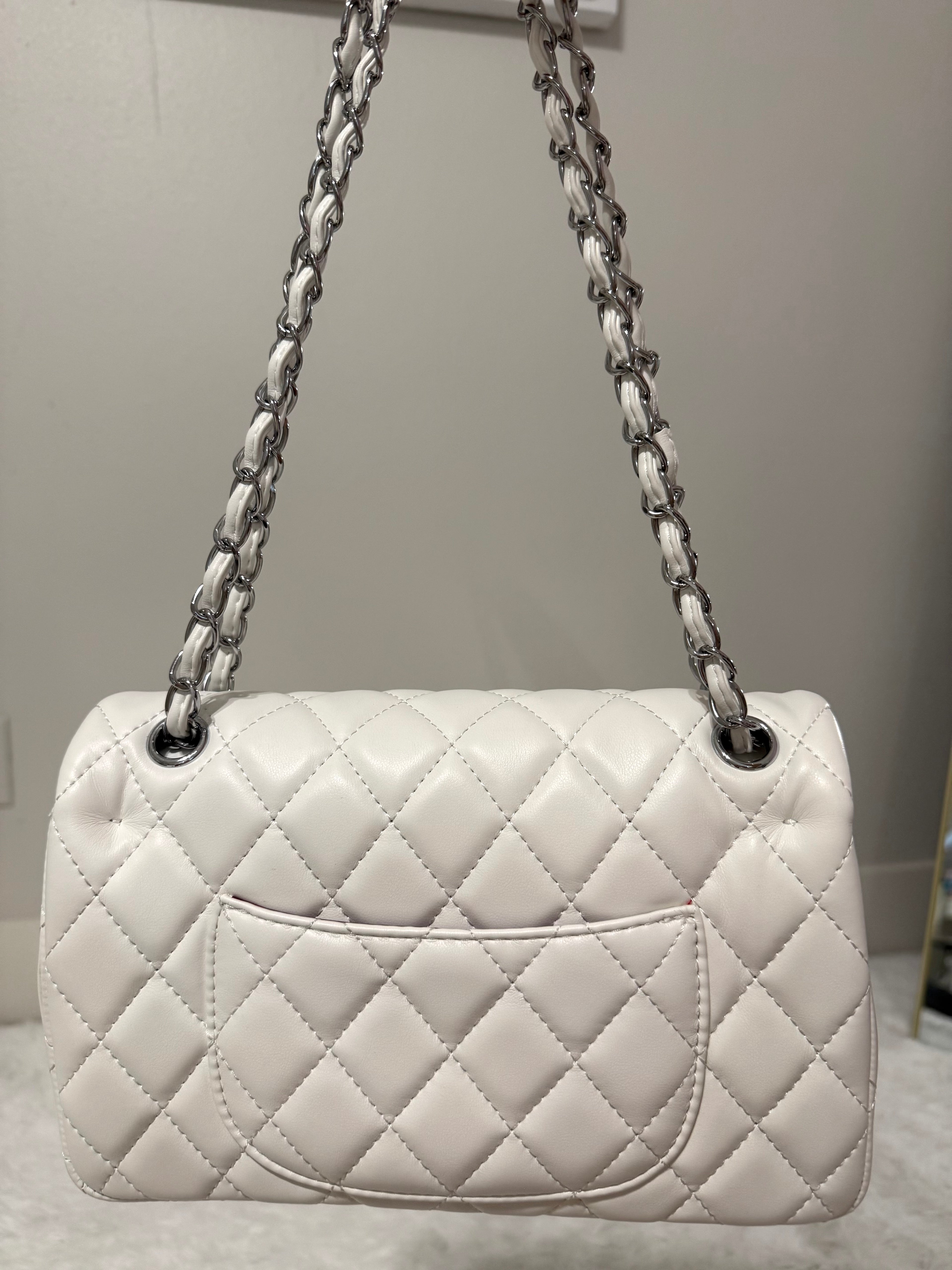 White cc with silver chain