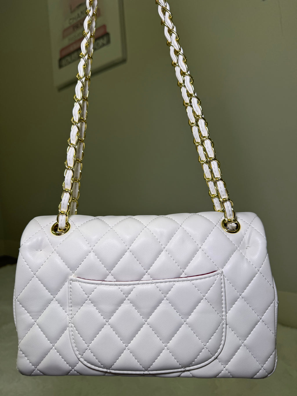 White cc with gold chain