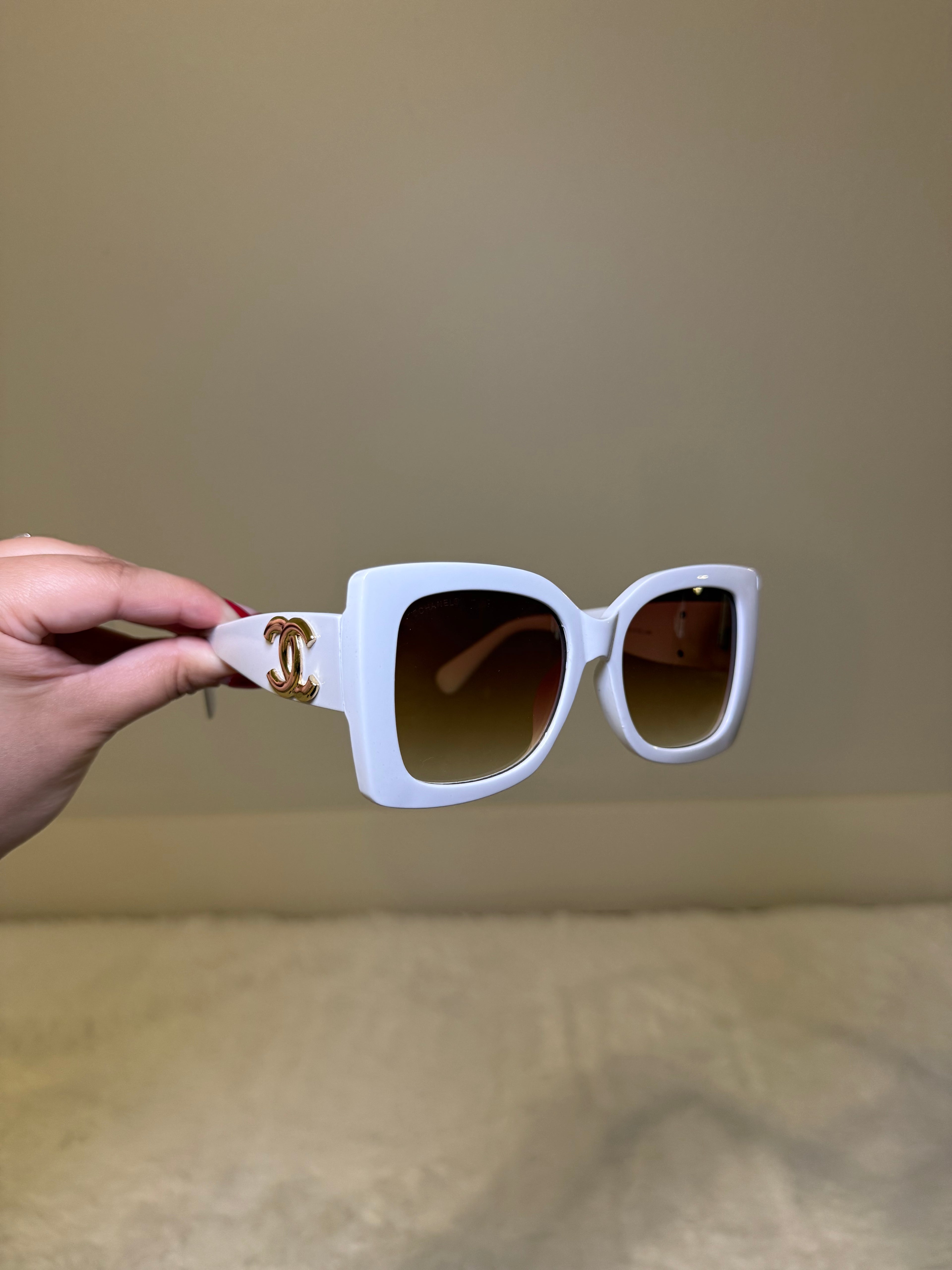 White and gold cc sunglasses
