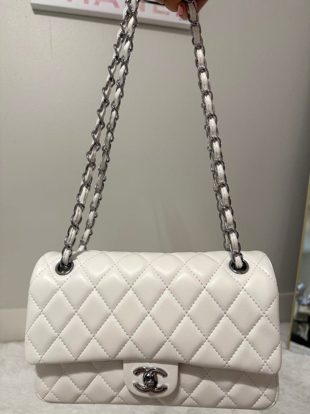 White cc with silver chain